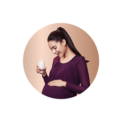 pregnant woman drinking milk