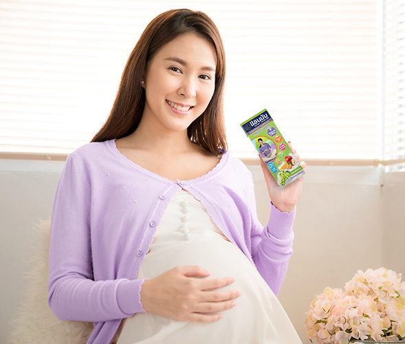 woman drinking yoghurt